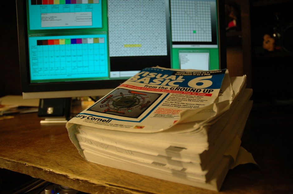 Early programming artifacts including book and programs